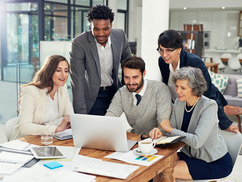 Cropped shot of a group of businesspeople meeting in the boardroom